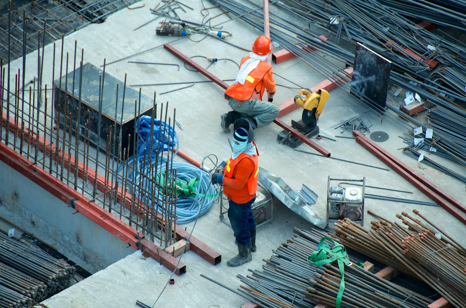 Concrete crew placing reinforcement on site, CraftWell Group London Ontario