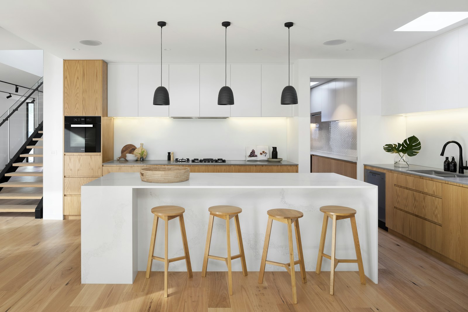 Renovated kitchen with island by CraftWell Group in London Ontario