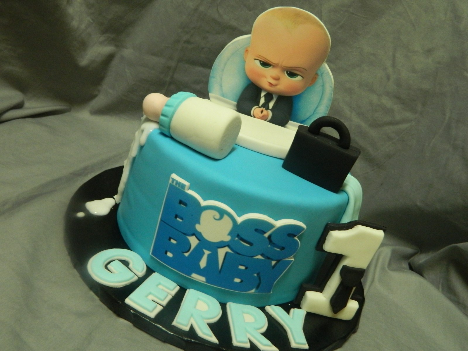 Boss Baby first birthday cake by Hey, Cupcake! in London Ontario