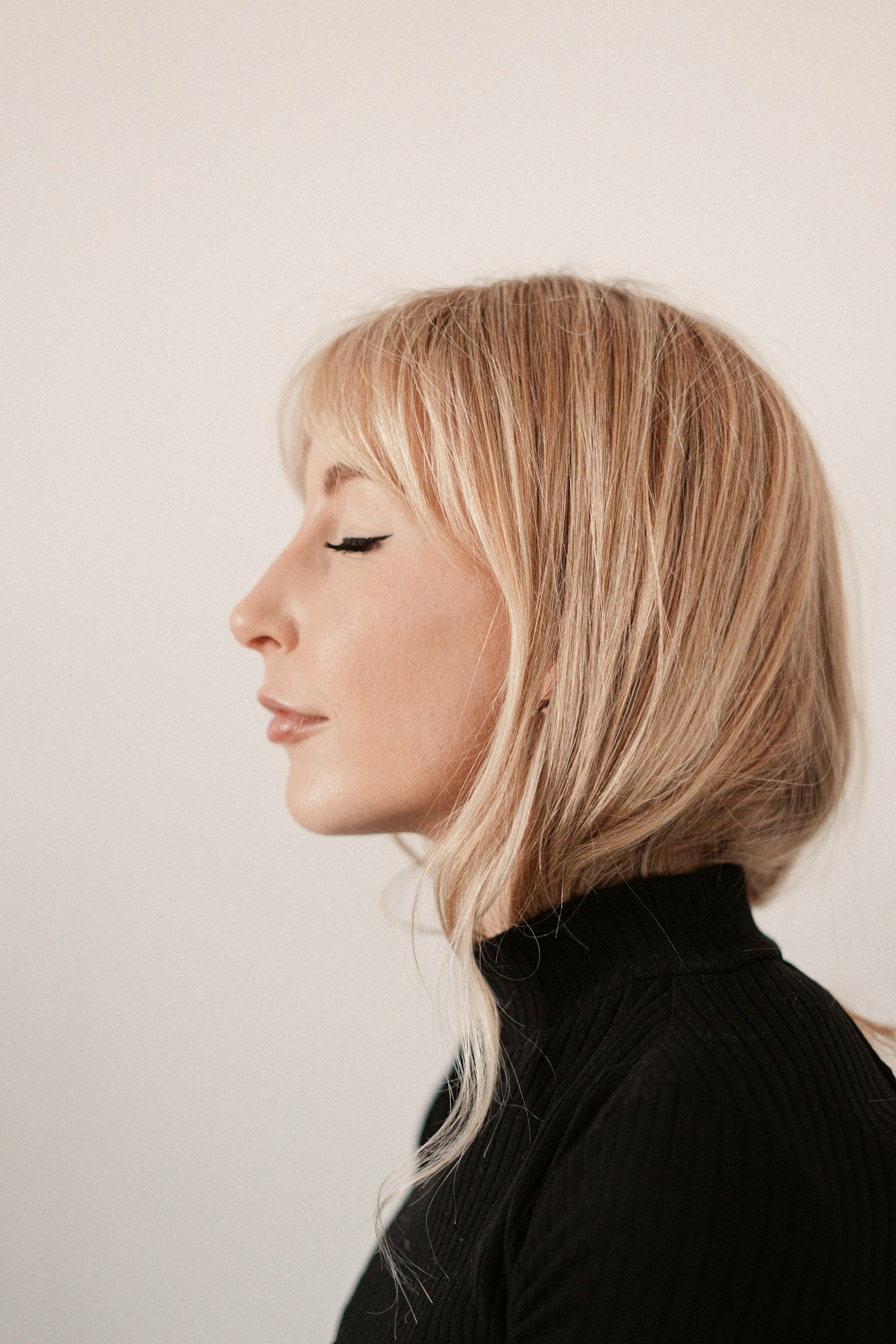 Editorial portrait showing soft, natural cosmetic detail