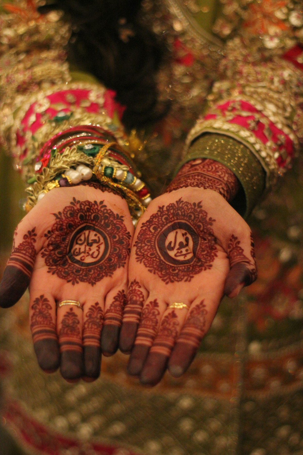 Detailed bridal henna mehndi design on hands at Be You Cosmo Studio London Ontario