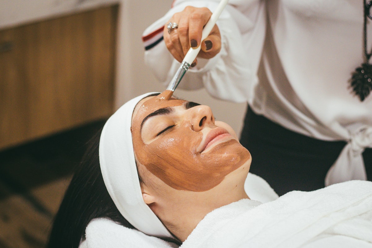 A facial treatment being applied to a relaxed client at Be You Cosmo Studio in Byron, London Ontario