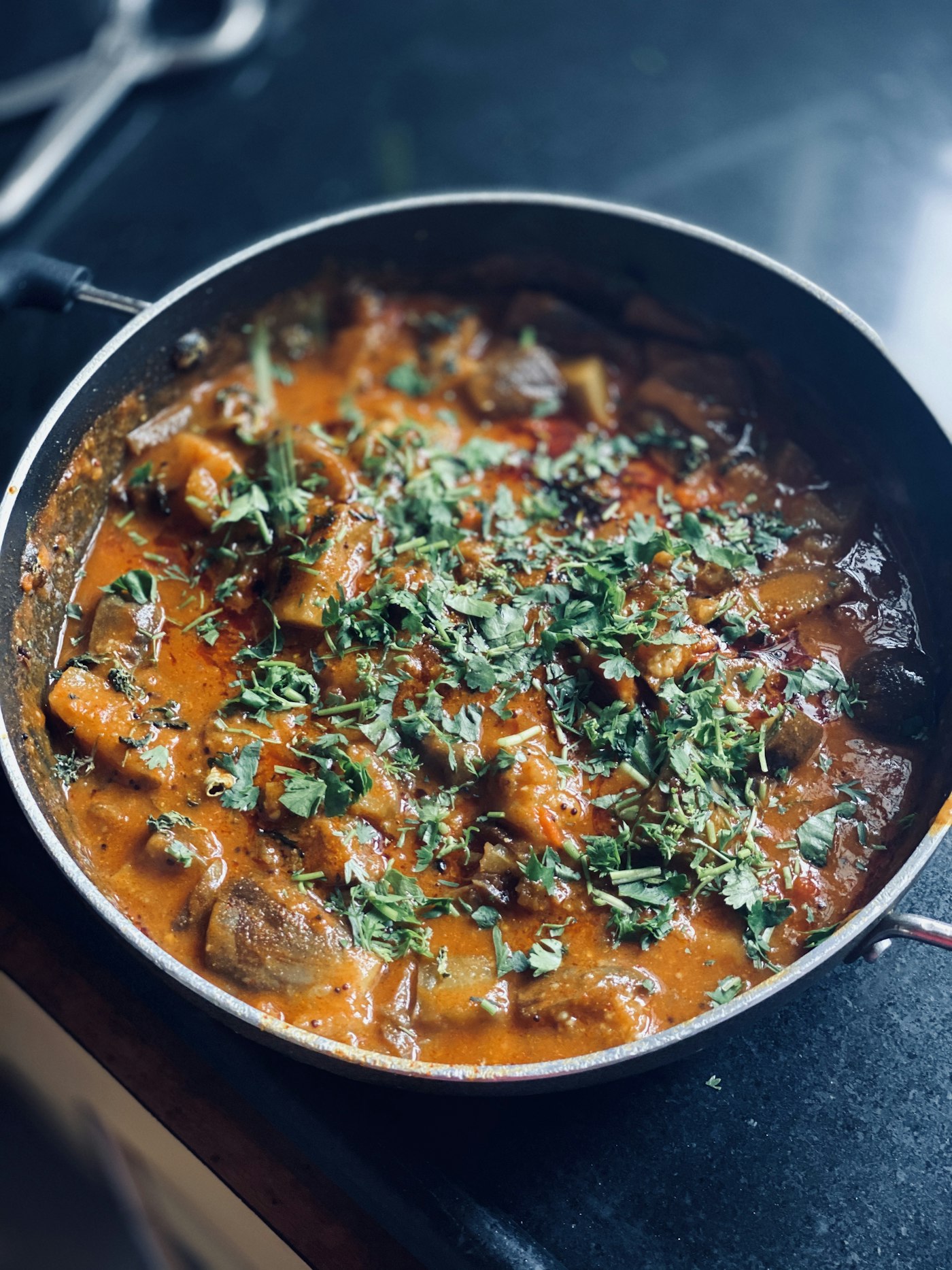A fresh curry finished with hand chopped cilantro in the Massey's kitchen