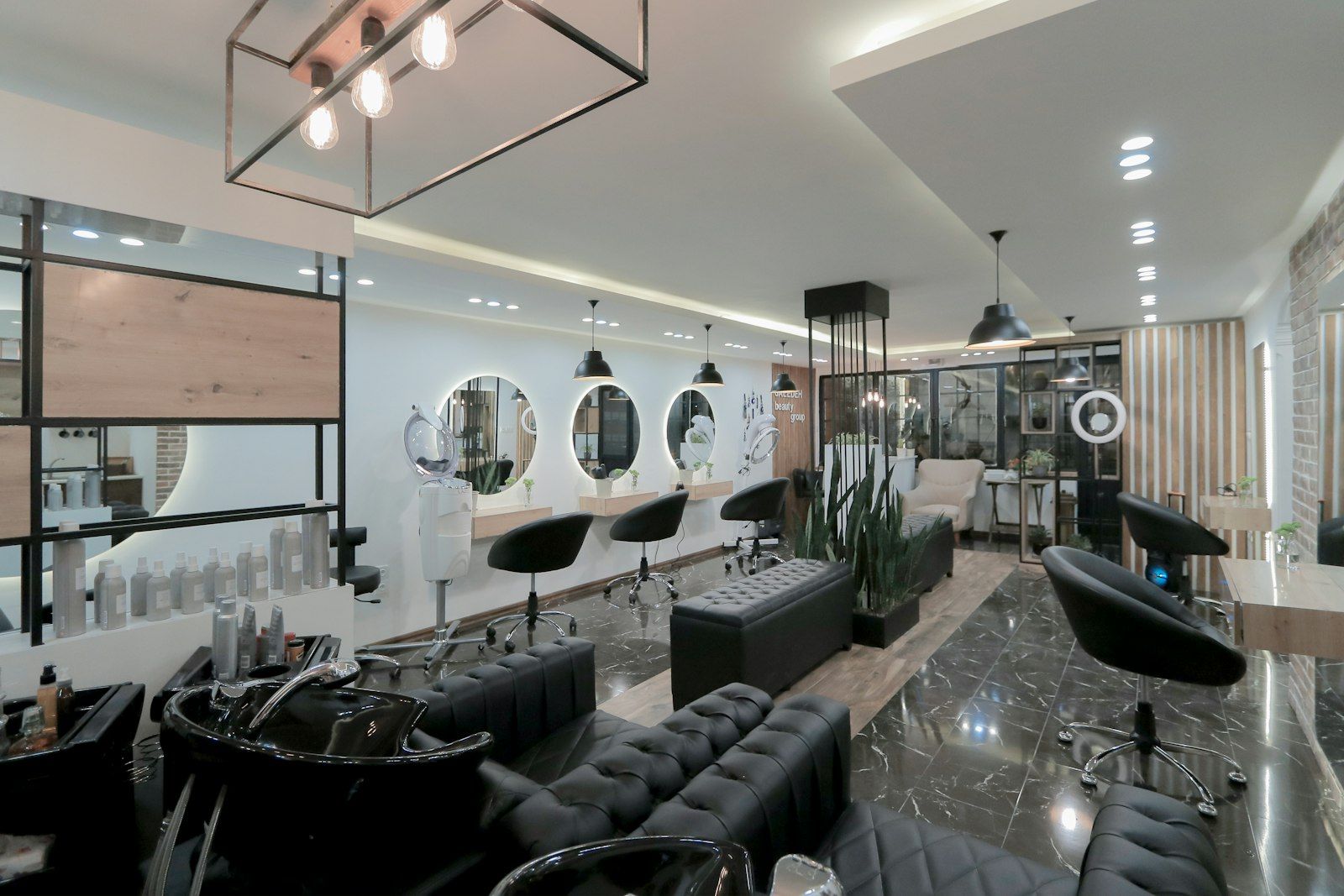 Elegant dark interior of the Michael Romeo Hair salon in London Ontario