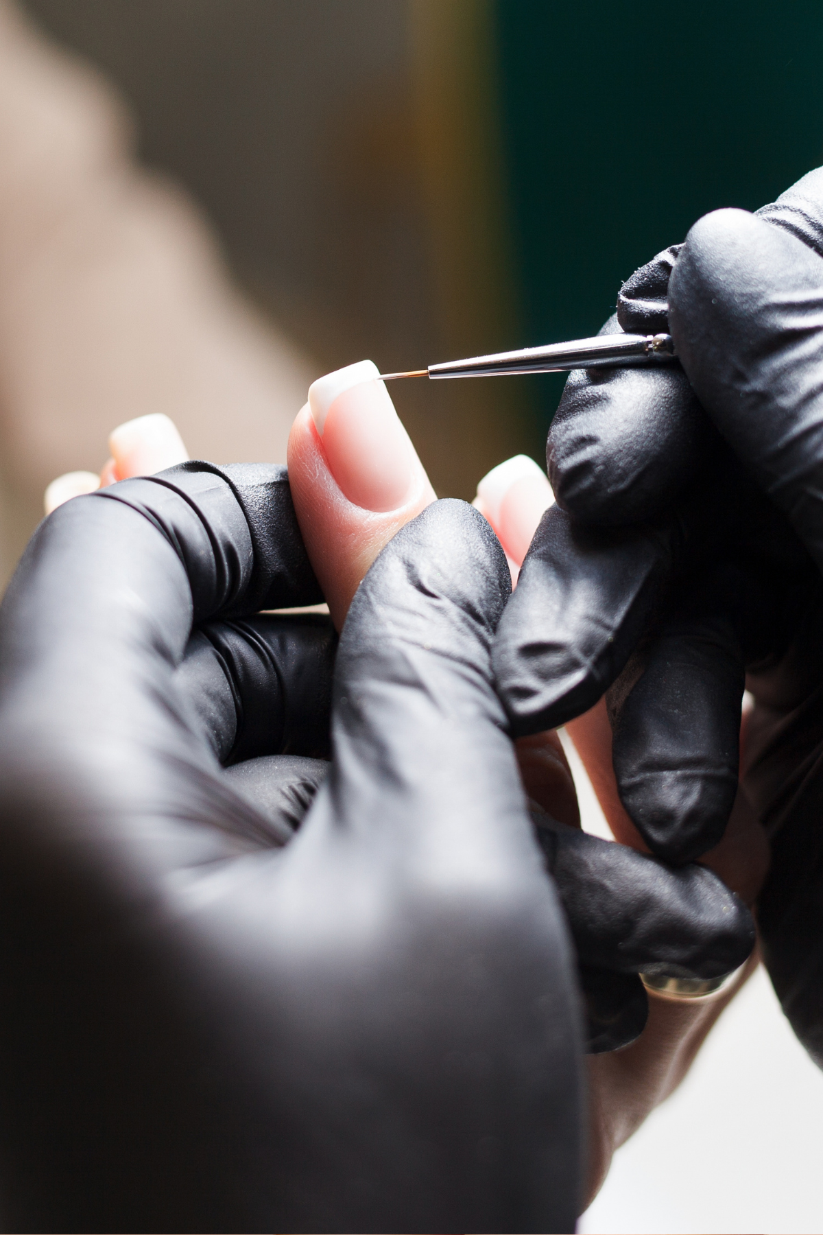Detailed non-toxic manicure in progress at Mon Papillon, London Ontario