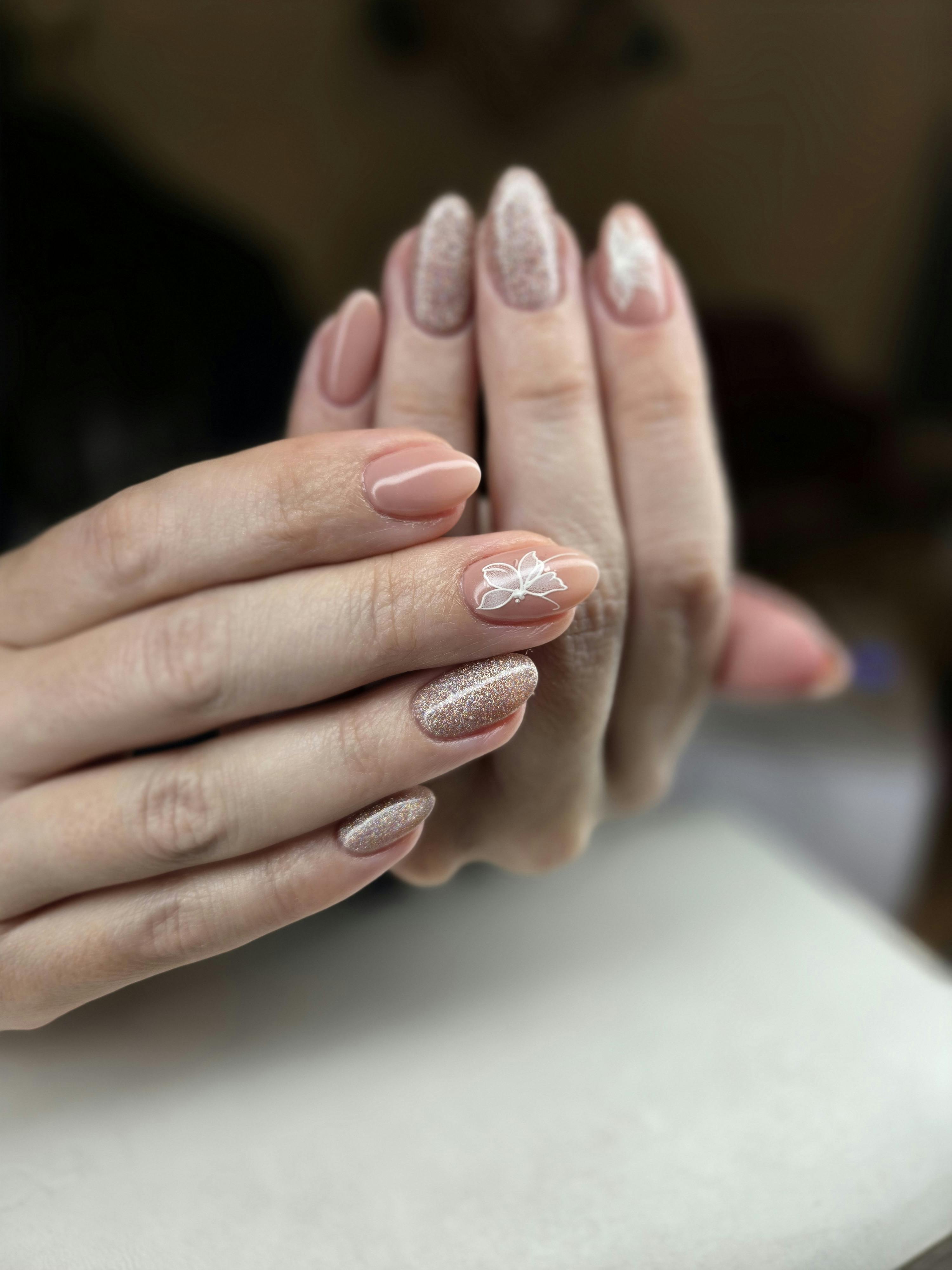 Real Nu Nail Studio work: glitter and floral nail art