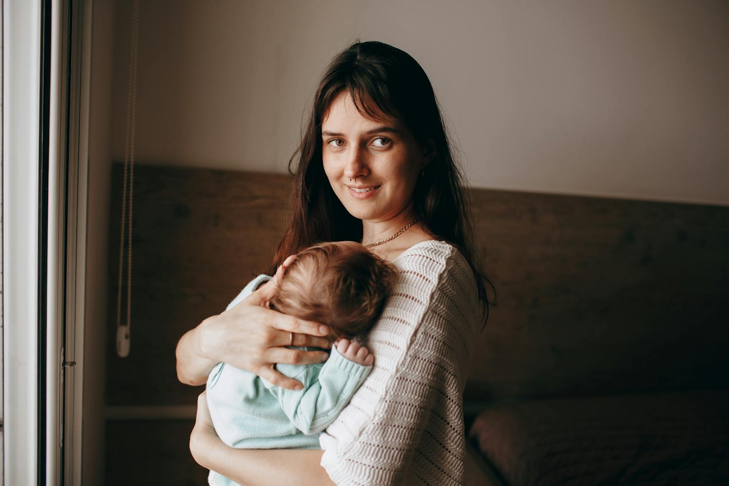 A mother and her newborn at Rebirth Wellness Byron Village