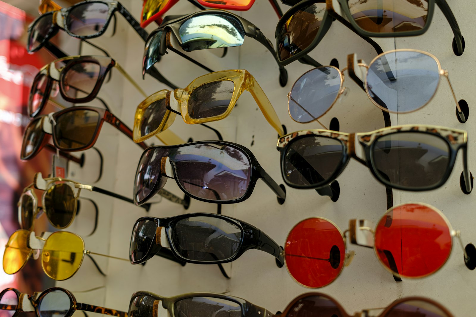 Colourful designer sunglasses on display at Squints Optical