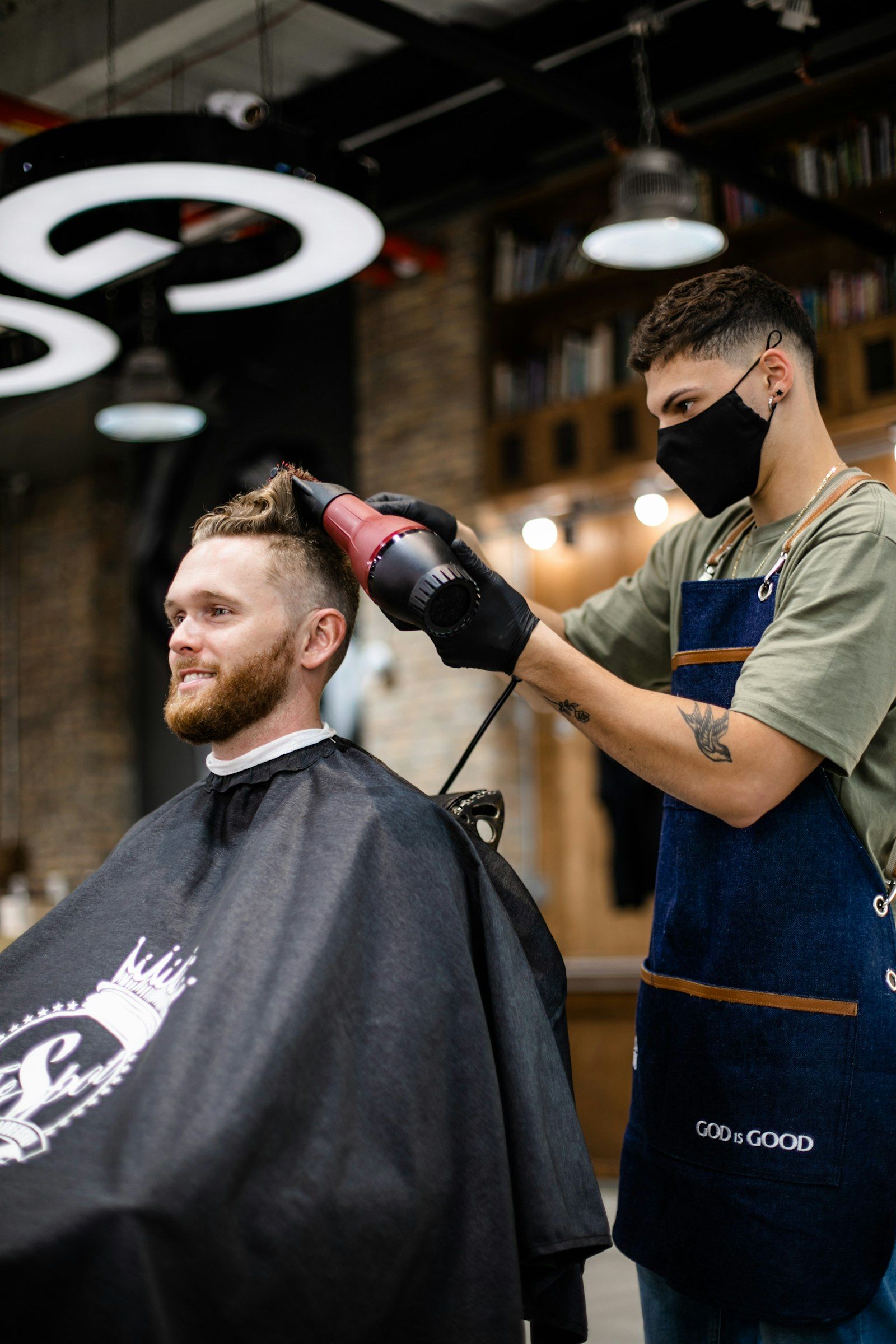 A man getting a haircut at Stylish Plus in London Ontario
