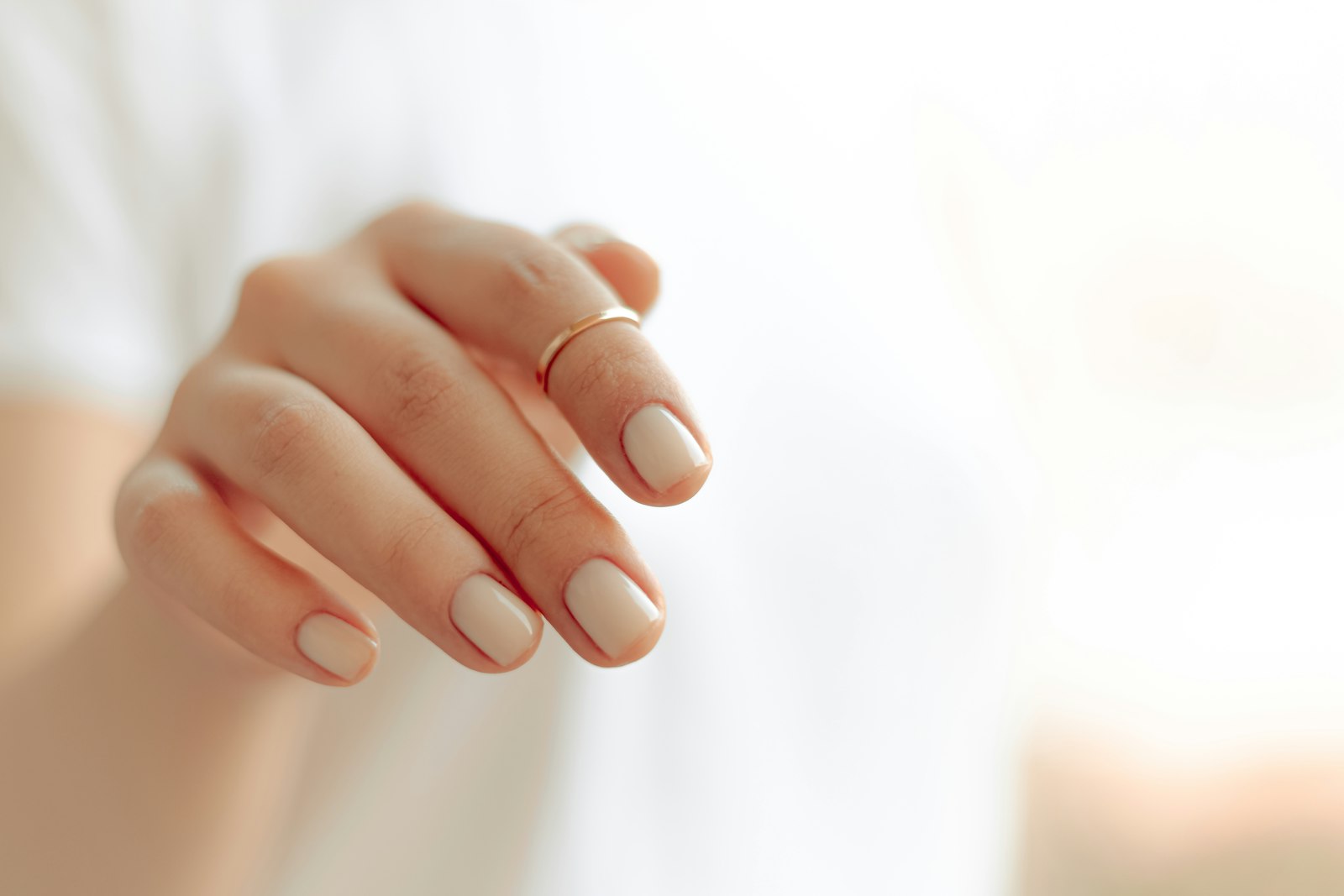 Premium nude gloss manicure at Zenn Nail Bar in London, Ontario