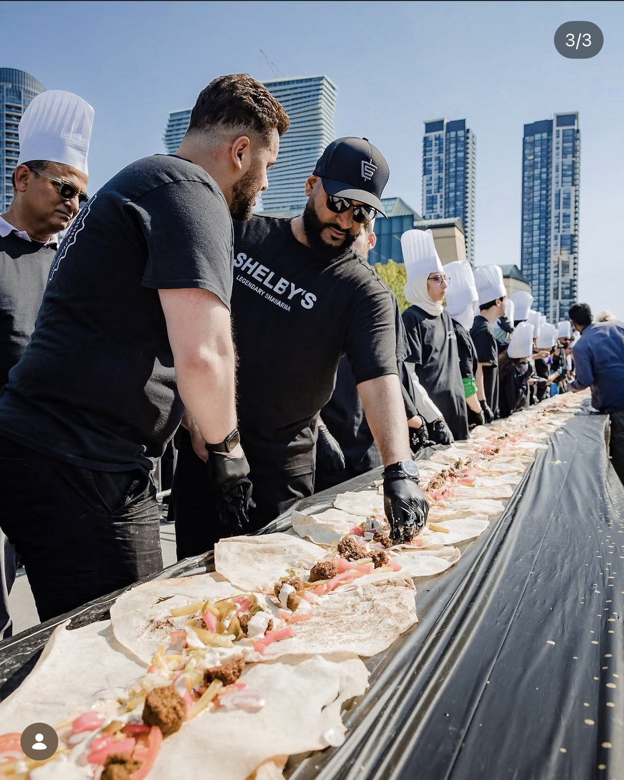 Shelby's team alongside the falafel wrap line.